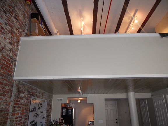 Main living space with second open loft above
