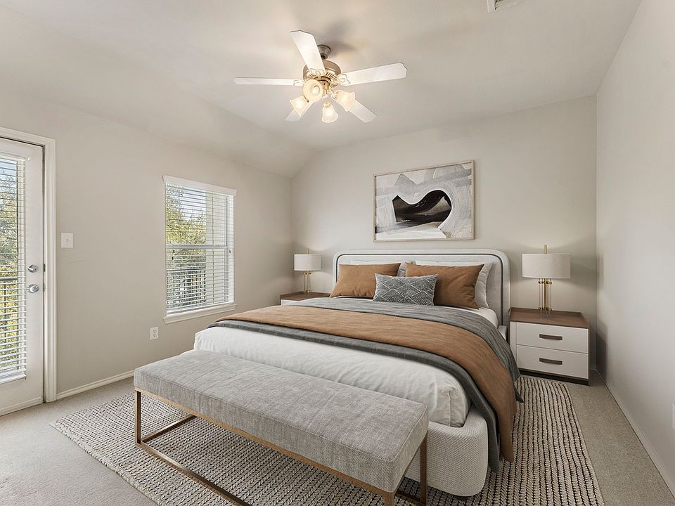 Master bedroom. Furnishings are staged.