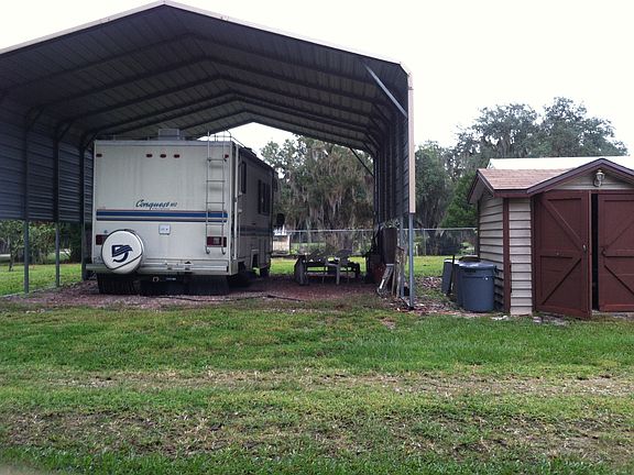 RV port and utility shed