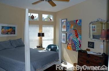 Master bedroom
						:
						Soft carpeting and three windows allow ocean breezes and comfortable sleeping.