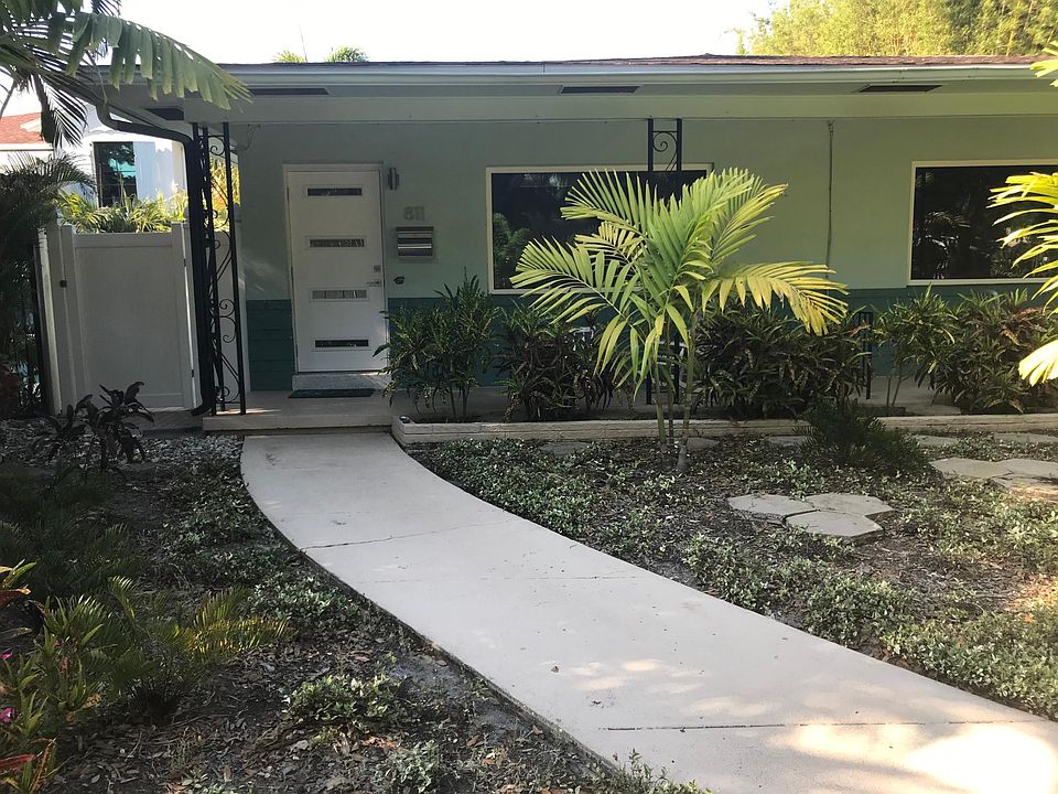View of modern front entry door and area
