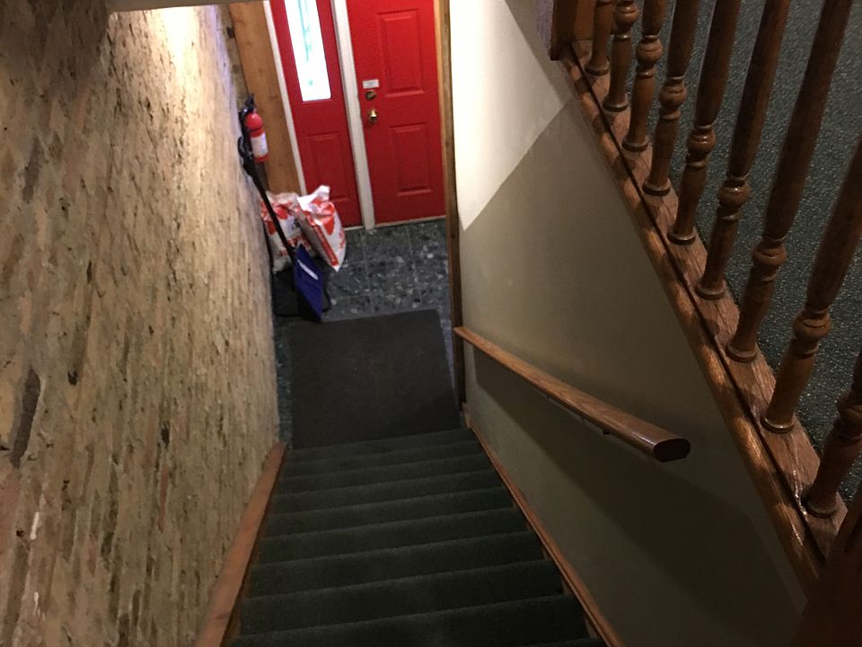 Exposed brick entrance hallways