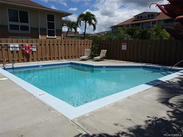 Sparkling recently upgraded pool  located with a barbeque area in a protected area of the complex.