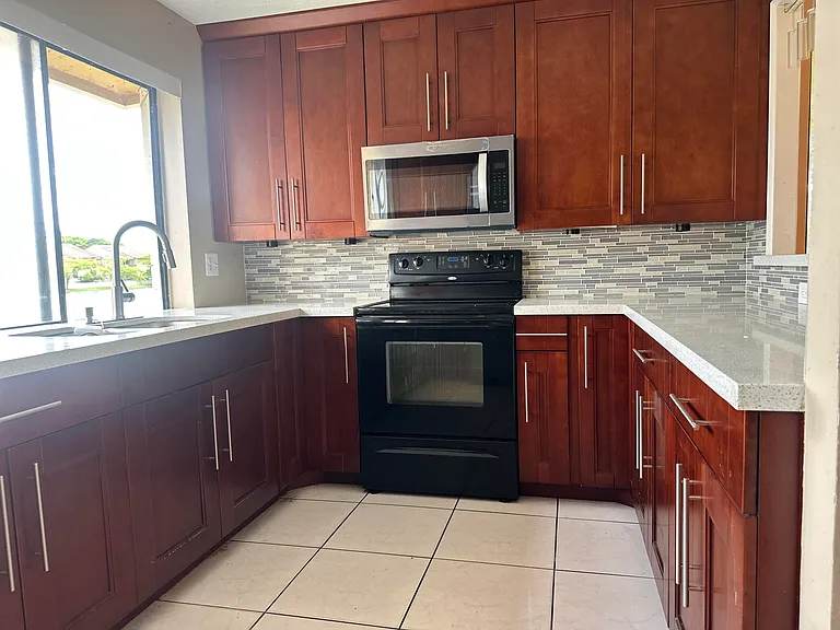 410 NW 214th St #105 — Photo 11