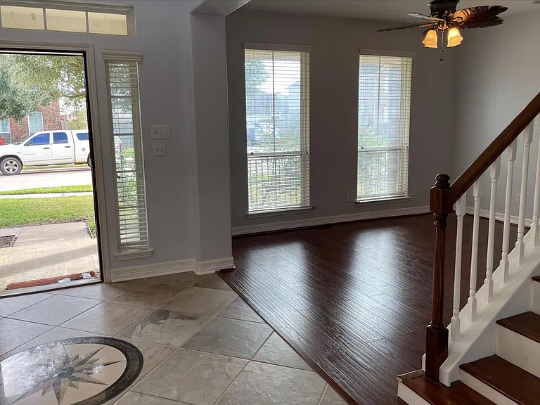 Front door, playroom and staircase