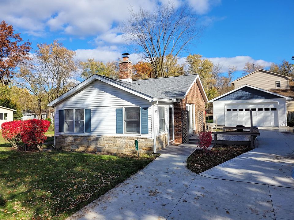 Spacious freshly updated home with 22' x 26' Garage with side entry.
