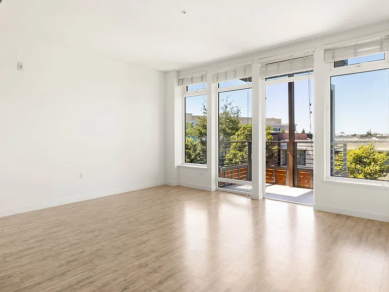 Living Room with Balcony and Hard Surface Flooring