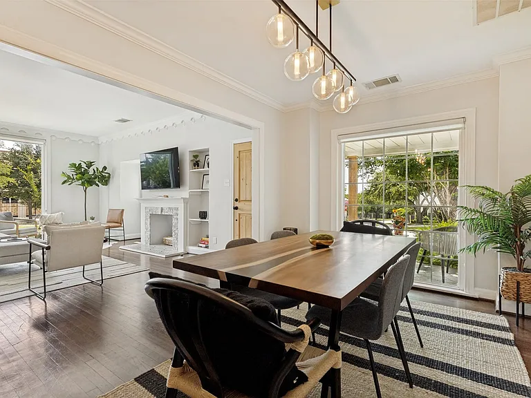 Dininga area is open to living and has an eat-in bar area open to the kitchen.