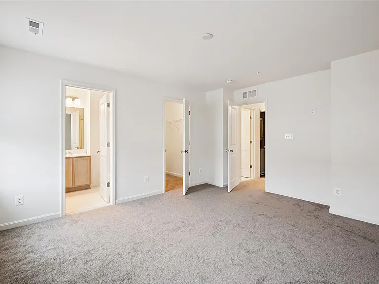 Primary Bedroom with walk in Closet