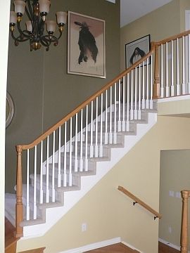 Warm color on large walls make for impactful art placement