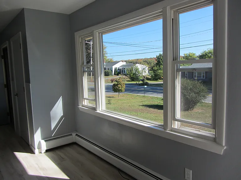 Big windows in living room.