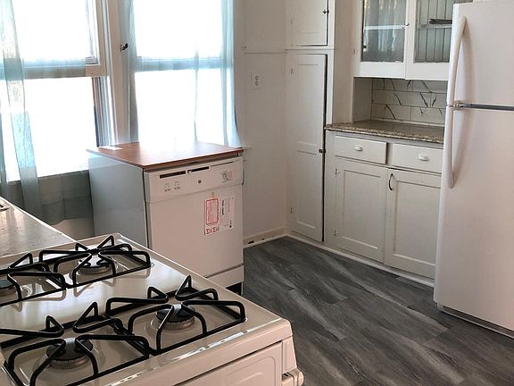 Beautifully lit kitchen with all new appliances