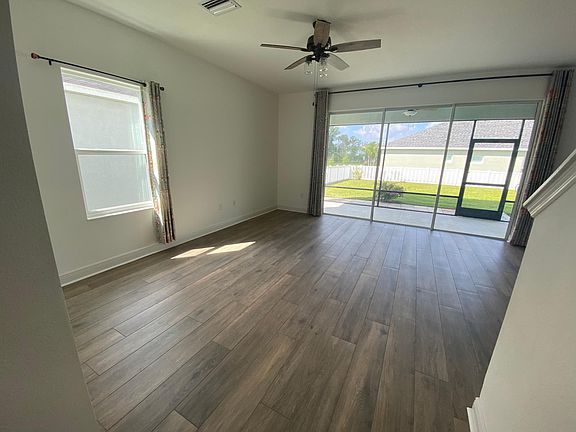 VIEW INTO FAMILY ROOM FROM ENTRY WAY