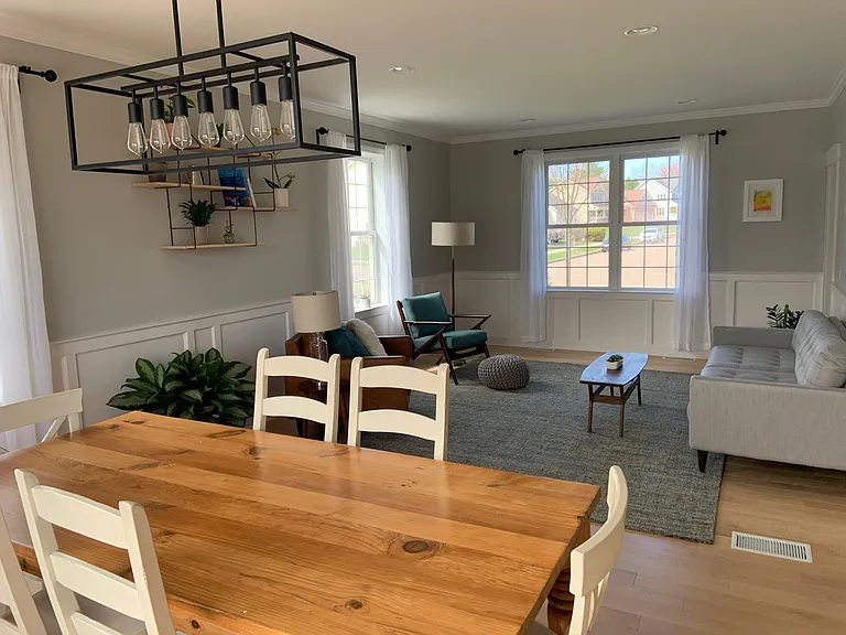 Furnished formal sitting area and dining room.
