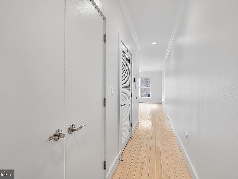 Entry way, coat closet and utility closet