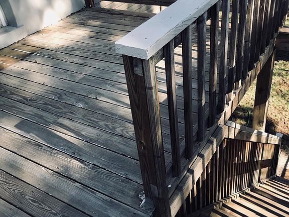 Deck overlooking private back yard