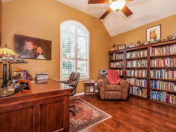 Stay efficient and organized in this private study.