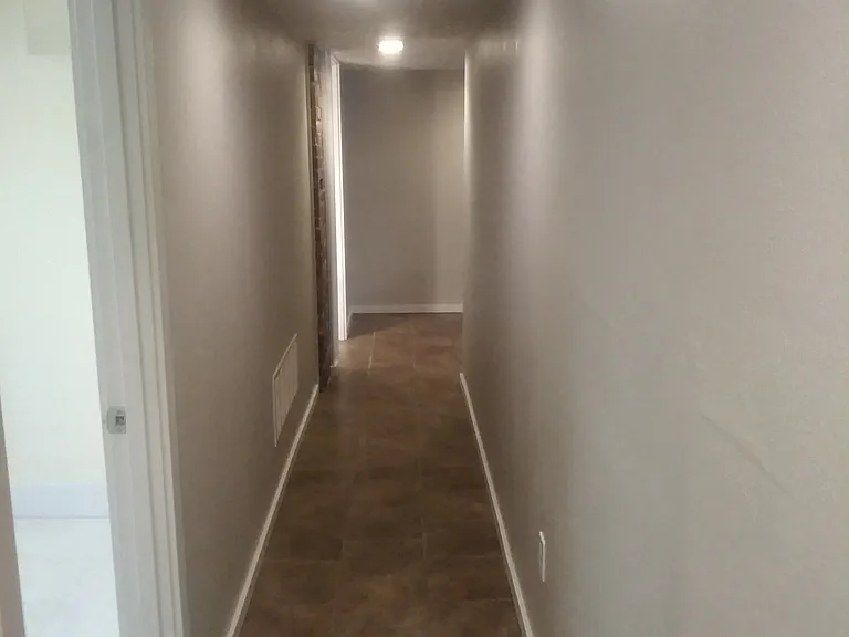 Hallway heading to family room and laundry room