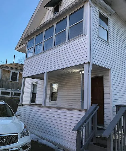 Utility porch on second floor and back entrance to the apartment.