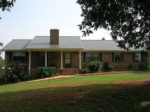 Brick with Metal Roof