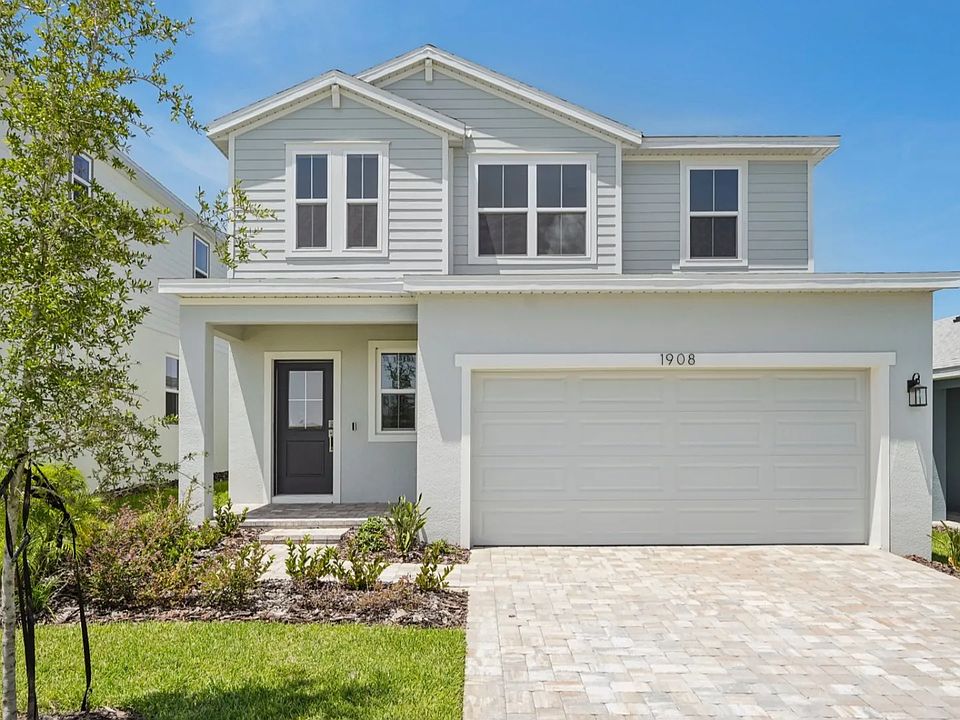 Jupiter Exterior Elevation in Hamilton Bluff by DRB Homes located in Haines City, FL.