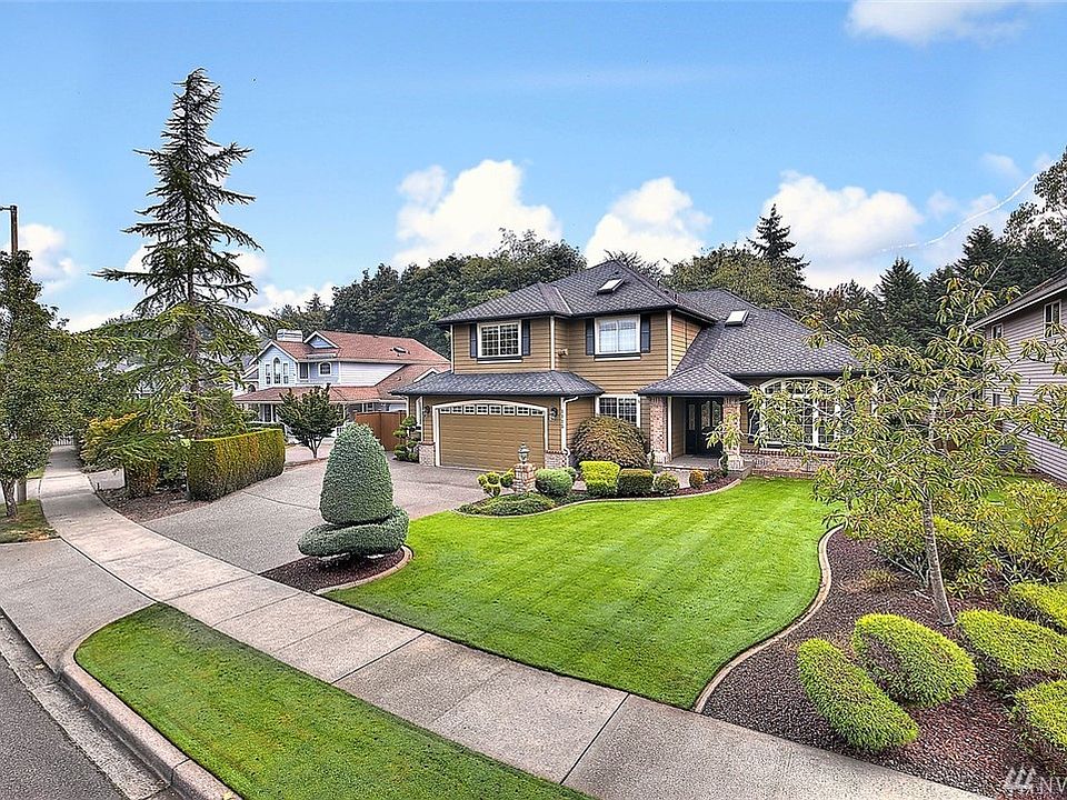 Meticulous landscaped settings, curbing, brick facing, and ample parking. 
