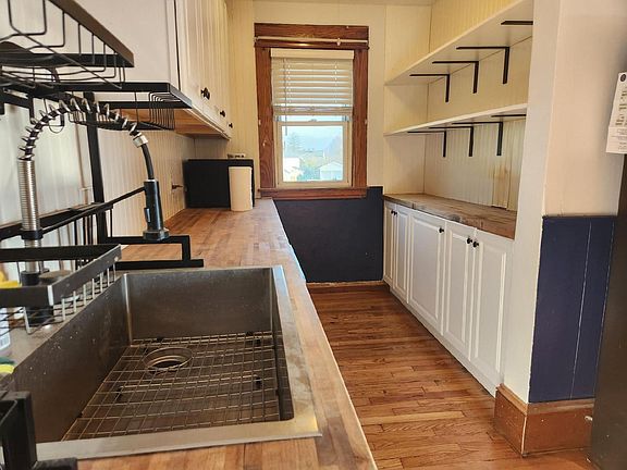 Pantry close up. New cabinets and butcher block countertops installed in 2020.