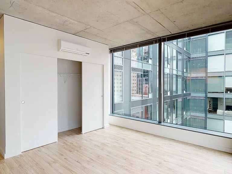 Apartment living room with wood-style flooring.