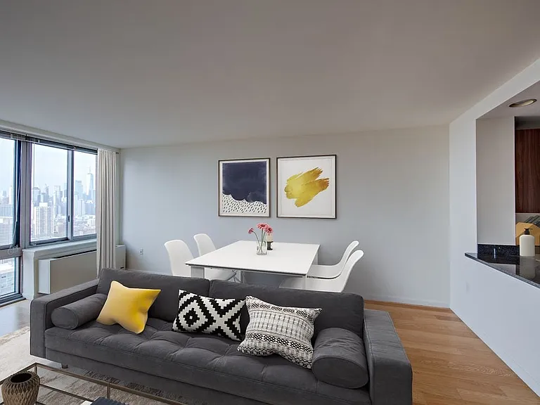 Classic Package I living and dining area with hard surface flooring