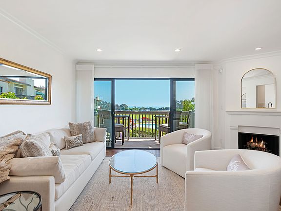 Lovely furnishings from Restoration Hardware and a cozy fireplace . Large screen TVs in living room and master bedroom and SONOS speakers throughout the home.