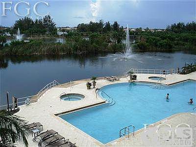 Pool with twin spas, lots of deck