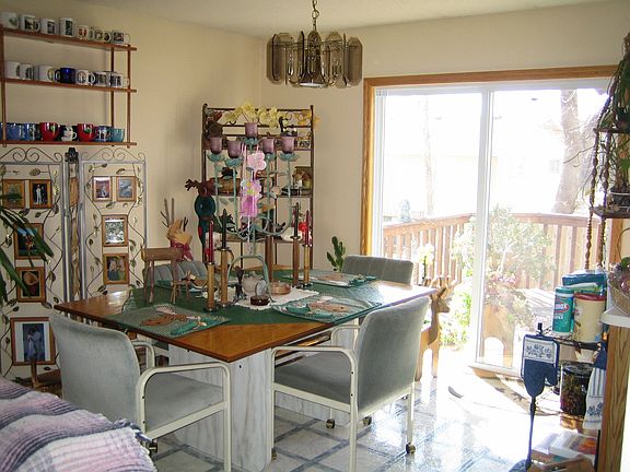 Dining walks out sliding doors to a large deck