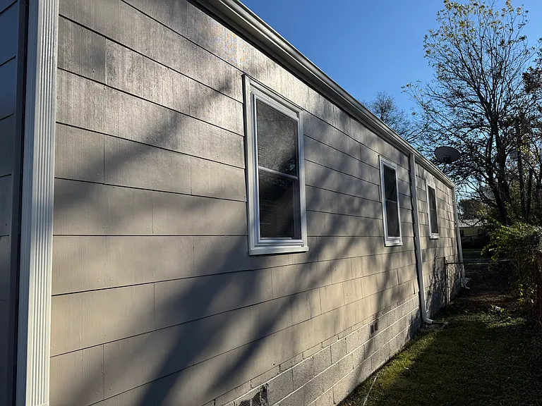 side of house with new windows installed