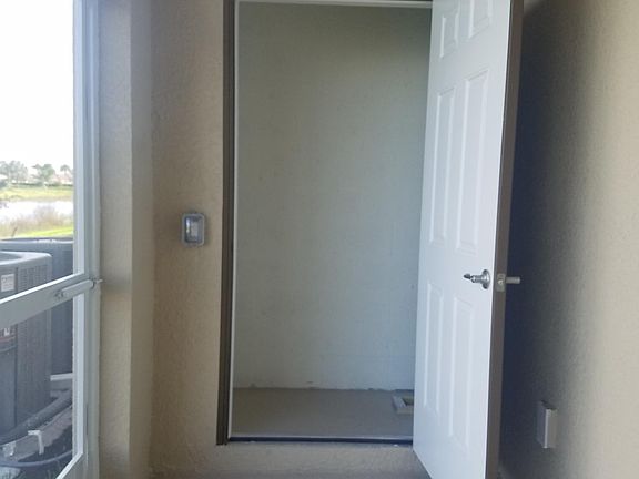 Lanai with closet (hurricane shutters)