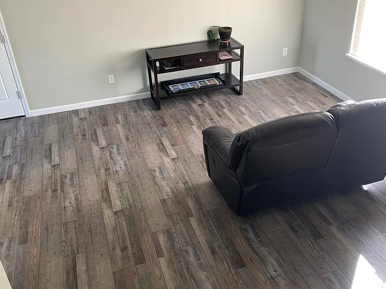 View of living room from the top of the stairs