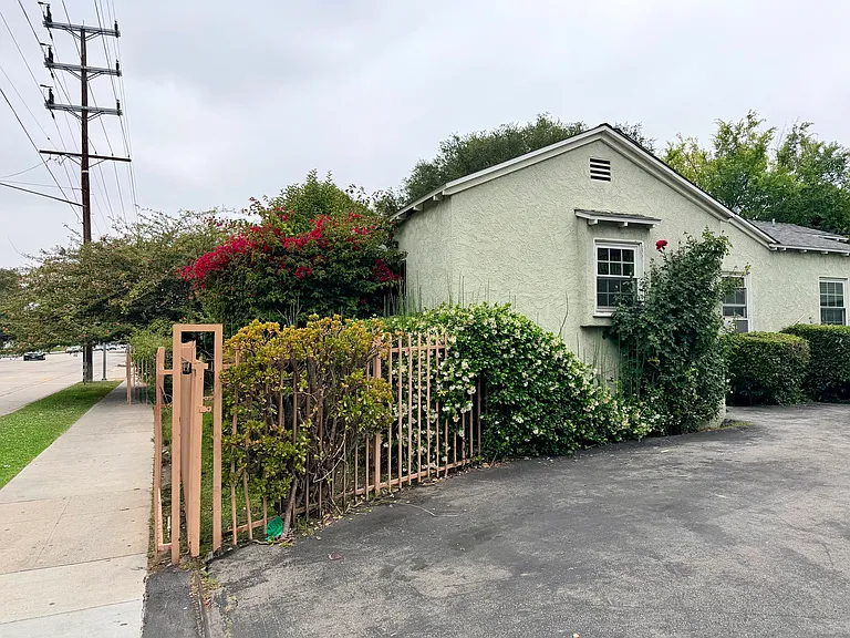 Side view with gated driveway