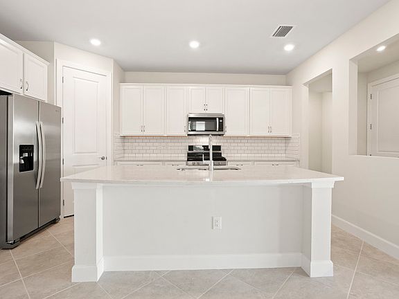 Kitchen with stainless steel gas appliances