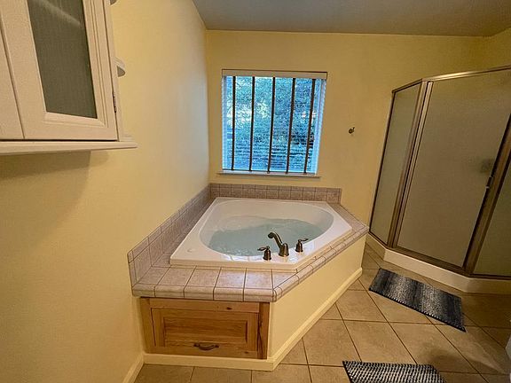 Jetted Tub and enclosed walk-in Shower