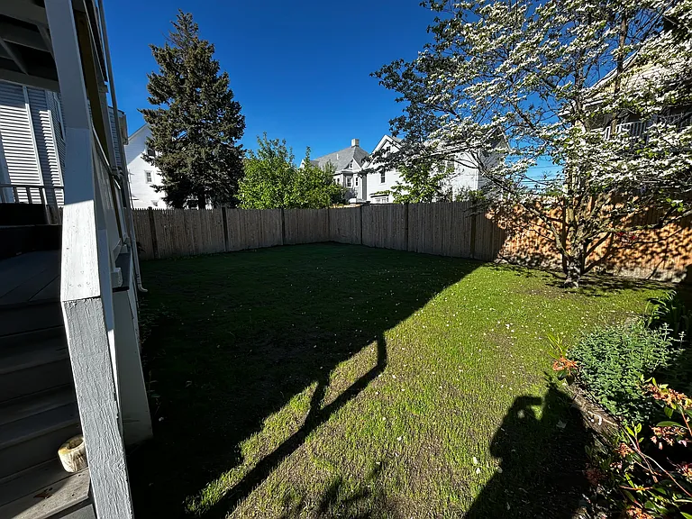Fenced in backyard - shaed with downstairs tenant.
