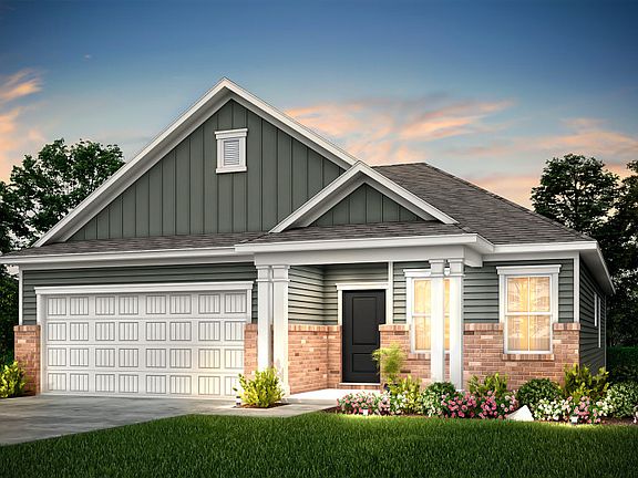 Morgan Exterior L32S with brick accents and a 2-car garage