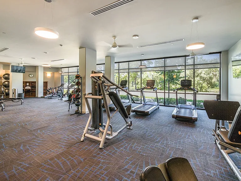 Strength and cardio equipment featured in the clubroom