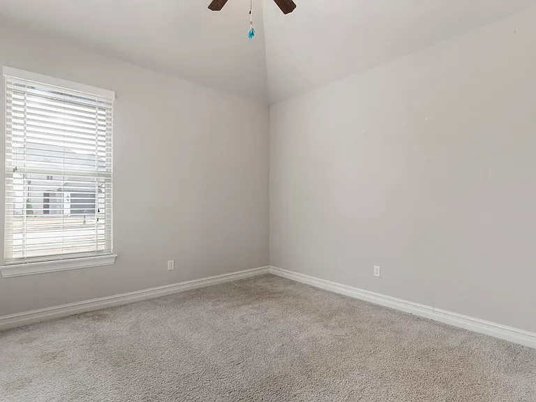 Front bedroom with vaulted ceiling