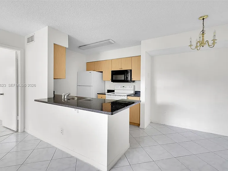 755 NW 104th Ave #104 — Photo 5