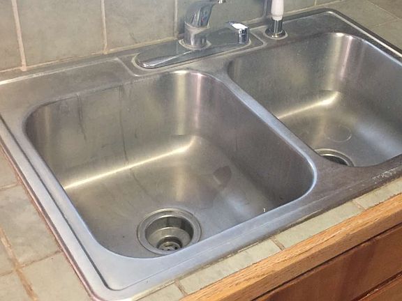 Stainless steel sink and tile counter