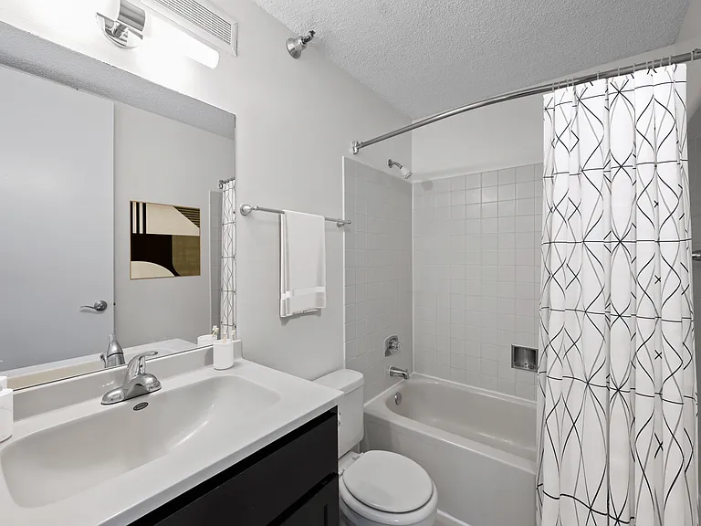 Brightly lit bathroom at Presidential Towers in Chicago IL