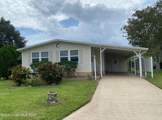 601 Dolphin Cir, Barefoot Bay, FL 32976