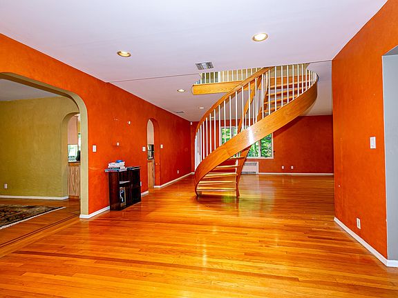 Living room with circular stairs
