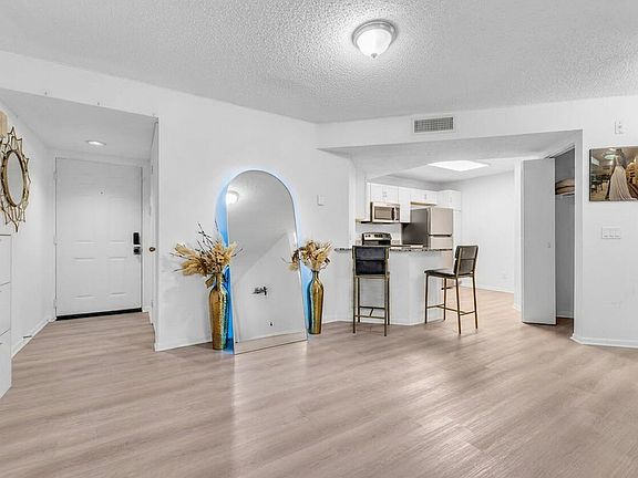 4th image of 8721 Wiles Rd APT 103