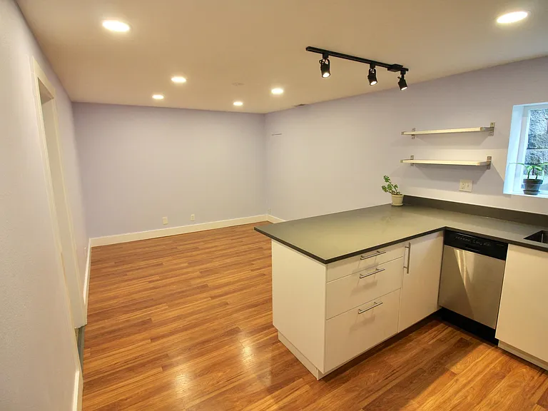 view of living space with room for full couch, coffee table,