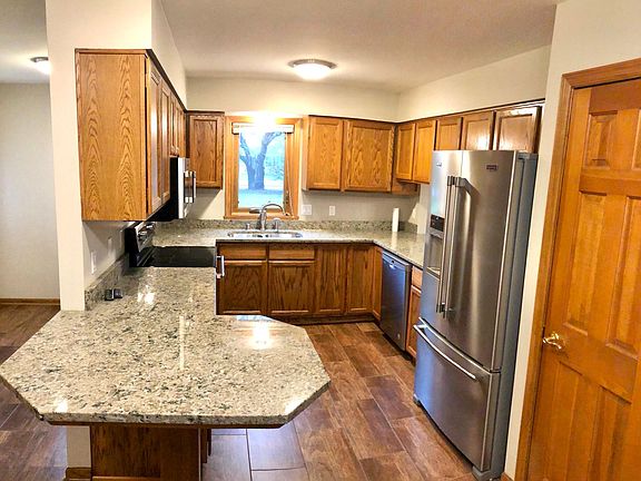 Kitchen granite and stainless appliances